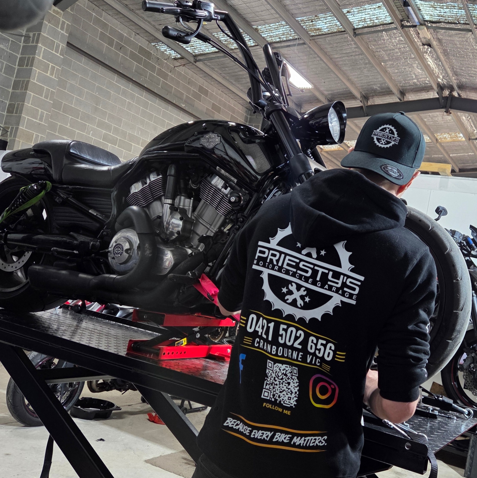 Working on a Harley-Davidson V-Rod at Priesty's Motorcycle Garage